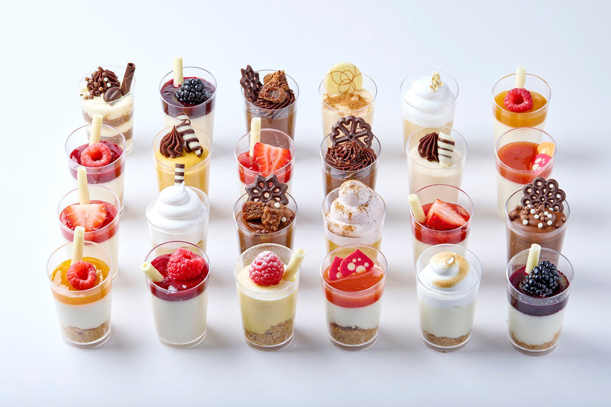 Dessert table with mini desserts and pavlovas for events in Miami