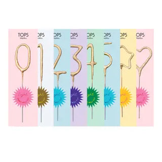 Mini Gold Sparklers are our bestseller! Perfect for birthdays, grad parties, anniversaries, New Year's Eve and more - celebrate any occasion with sparkles & joy. Sparklers can be great cake toppers, gift wrapping adornments, or used to create sparkling wedding toasts... they're everyone's favorite! Mini Gold Sparklers are sold in numbers 0-9 or shaped as stars and hearts.